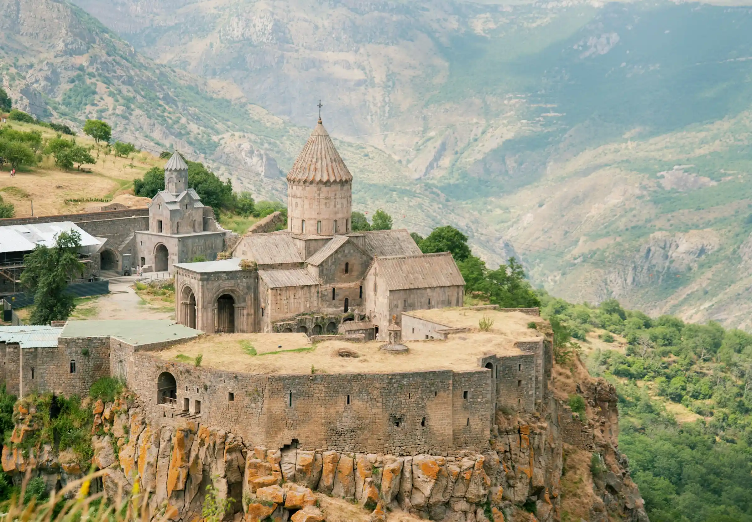 The medieval Tatev Monastery on a clifftop above a mountain gorge, Armenia