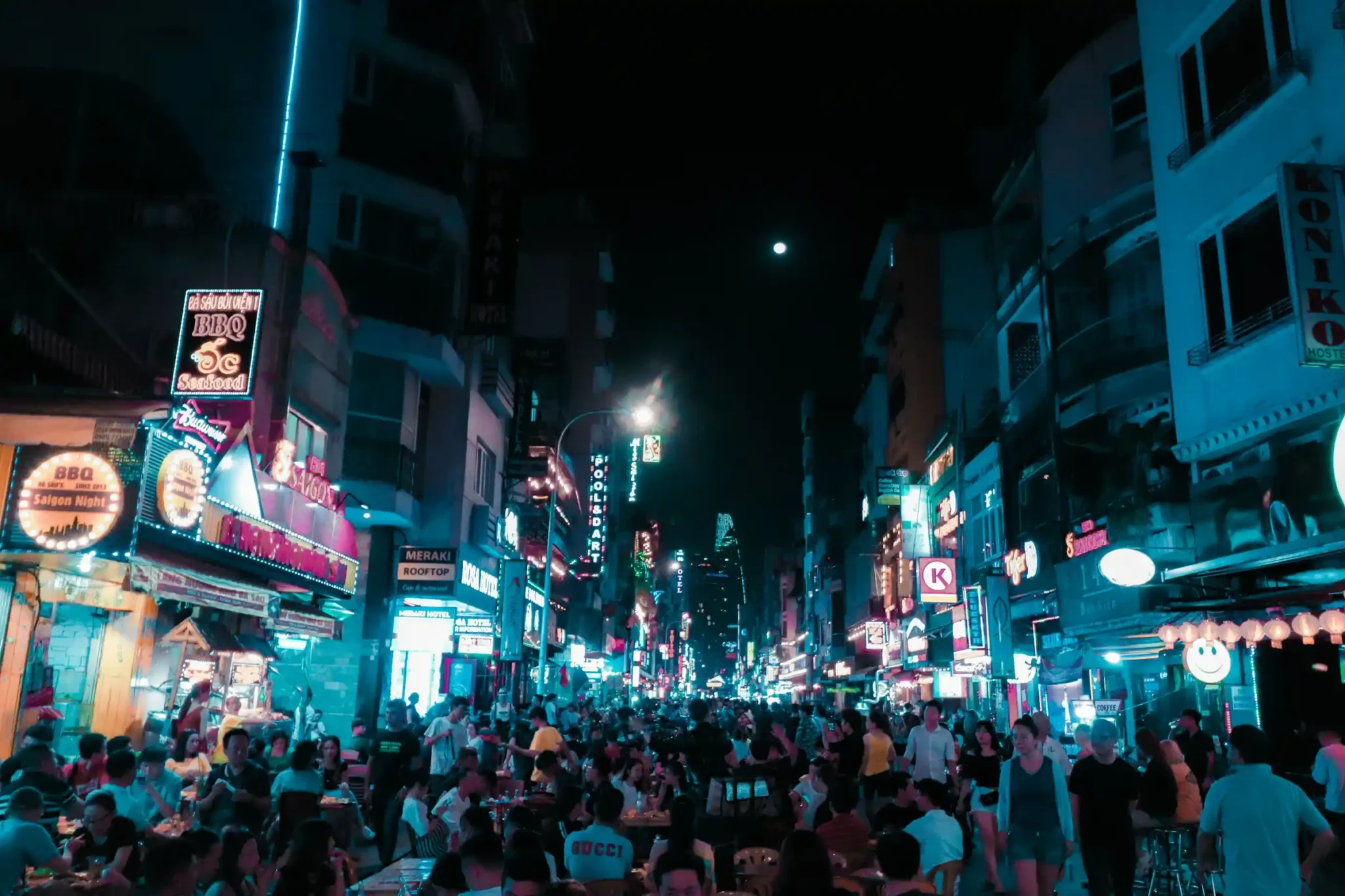 Street food market at night in Southeast Asia, an affordable travel destination
