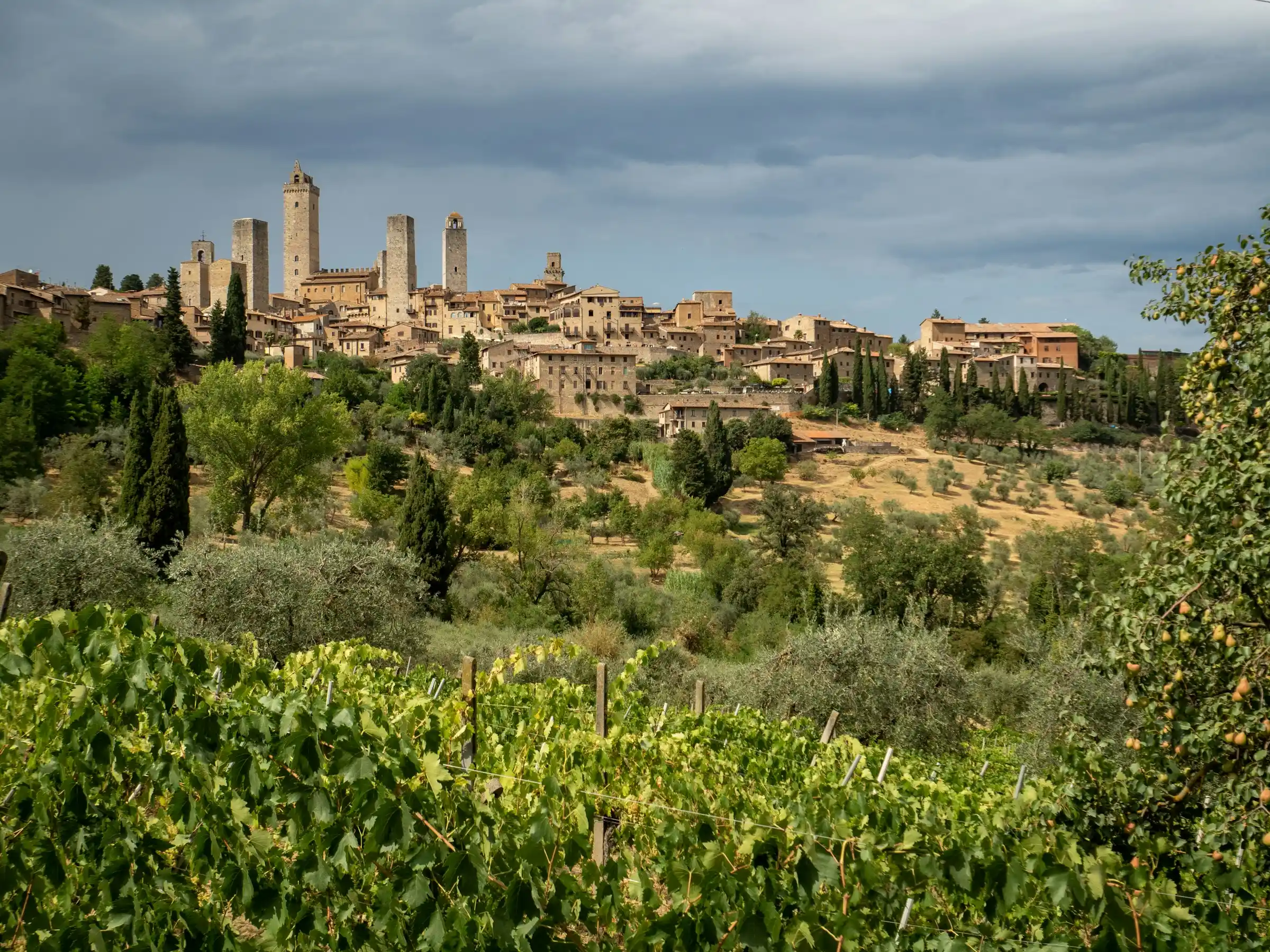 Street view in San Gimignano with medieval stone buildings