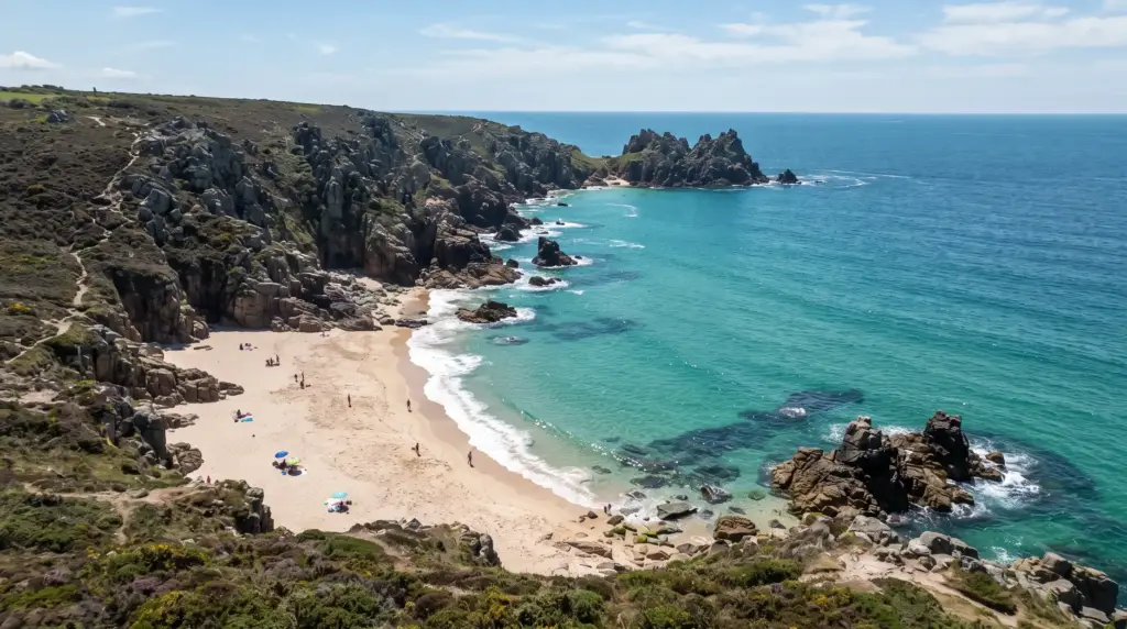 Turquoise water and granite cliffs at a Cornish cove