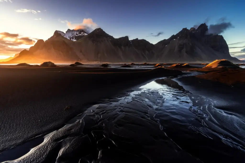 Reynisfjara black sand beach with sea stacks in Iceland