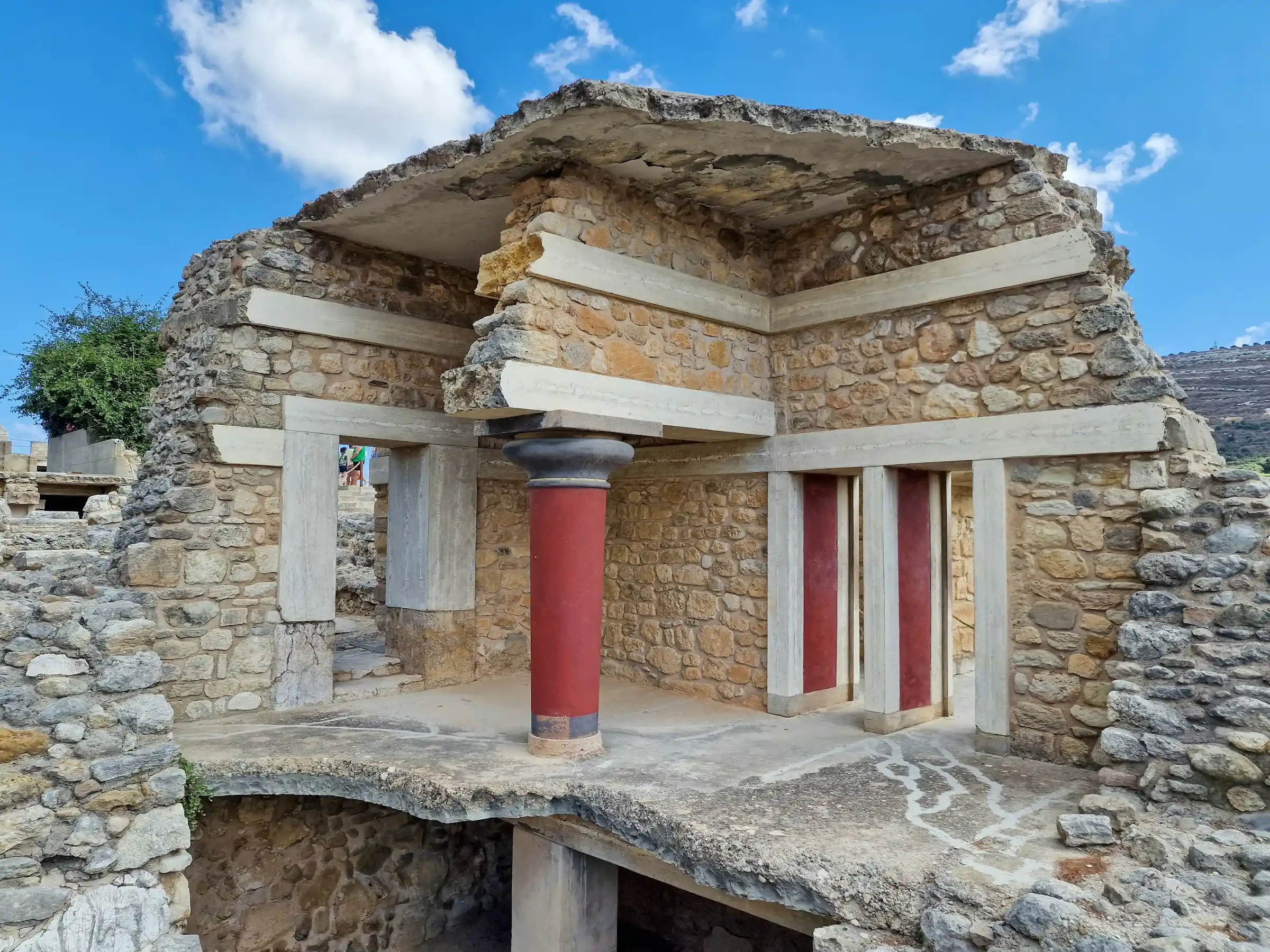 A reconstructed red column and chamber at the Palace of Knossos in Crete