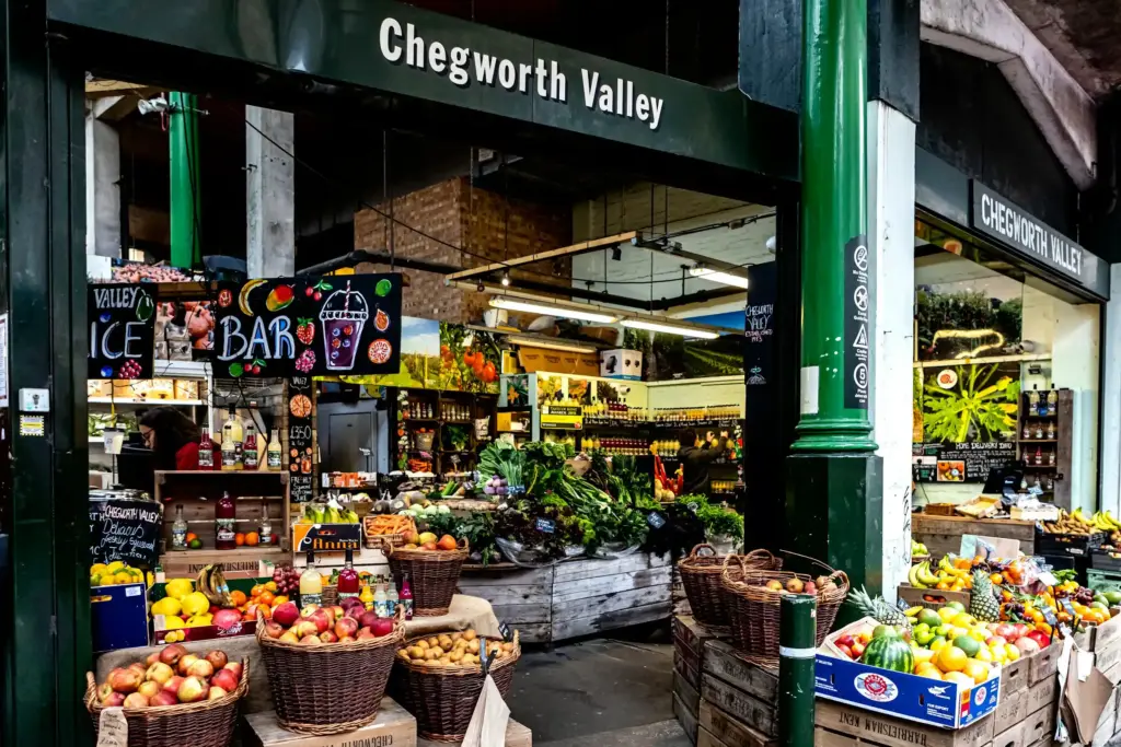 Food stalls under the Victorian roof of Borough Market
