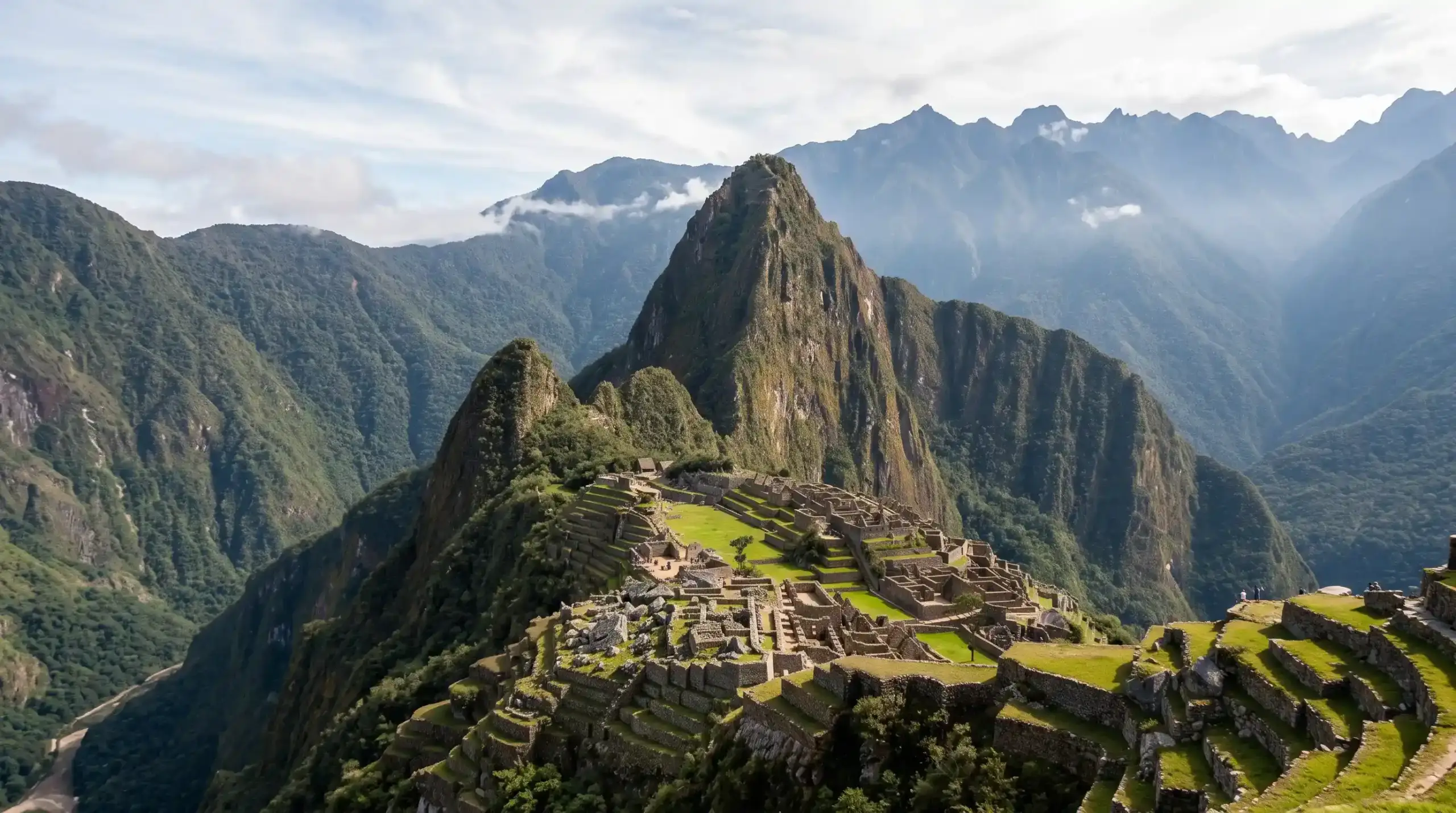 Panoramic view of Machu Picchu citadel surrounded by Andean peaks
