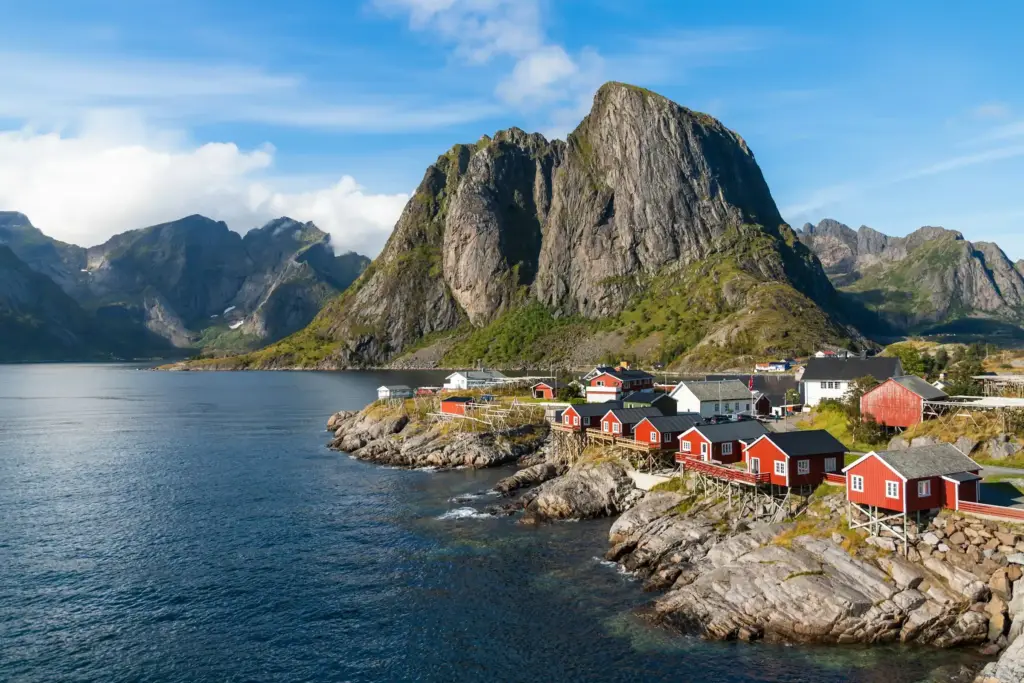 A dramatic Norwegian fjord with waterfalls between steep cliffs