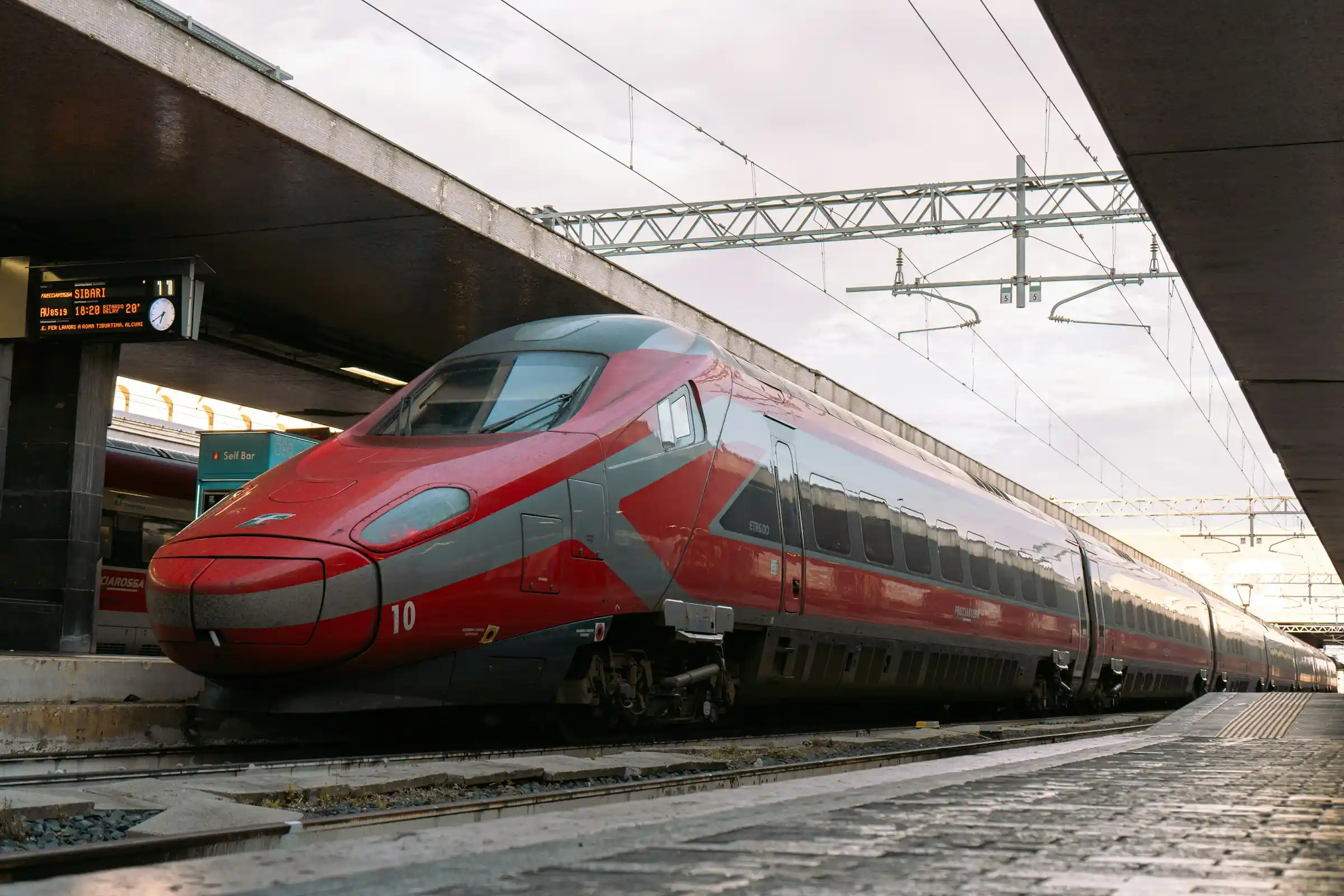 Passengers boarding a metro train at Termini station in Rome