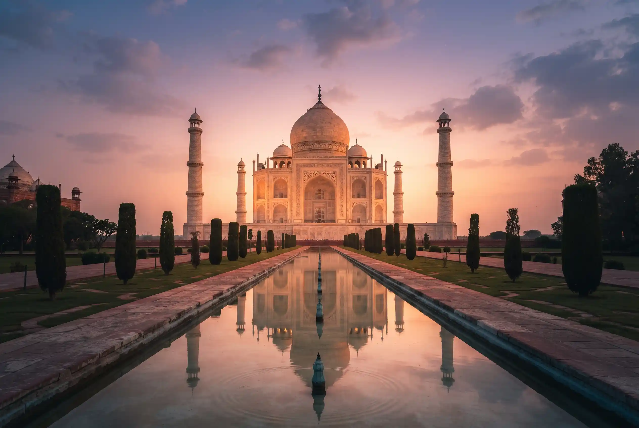 The Taj Mahal glowing gold at sunset