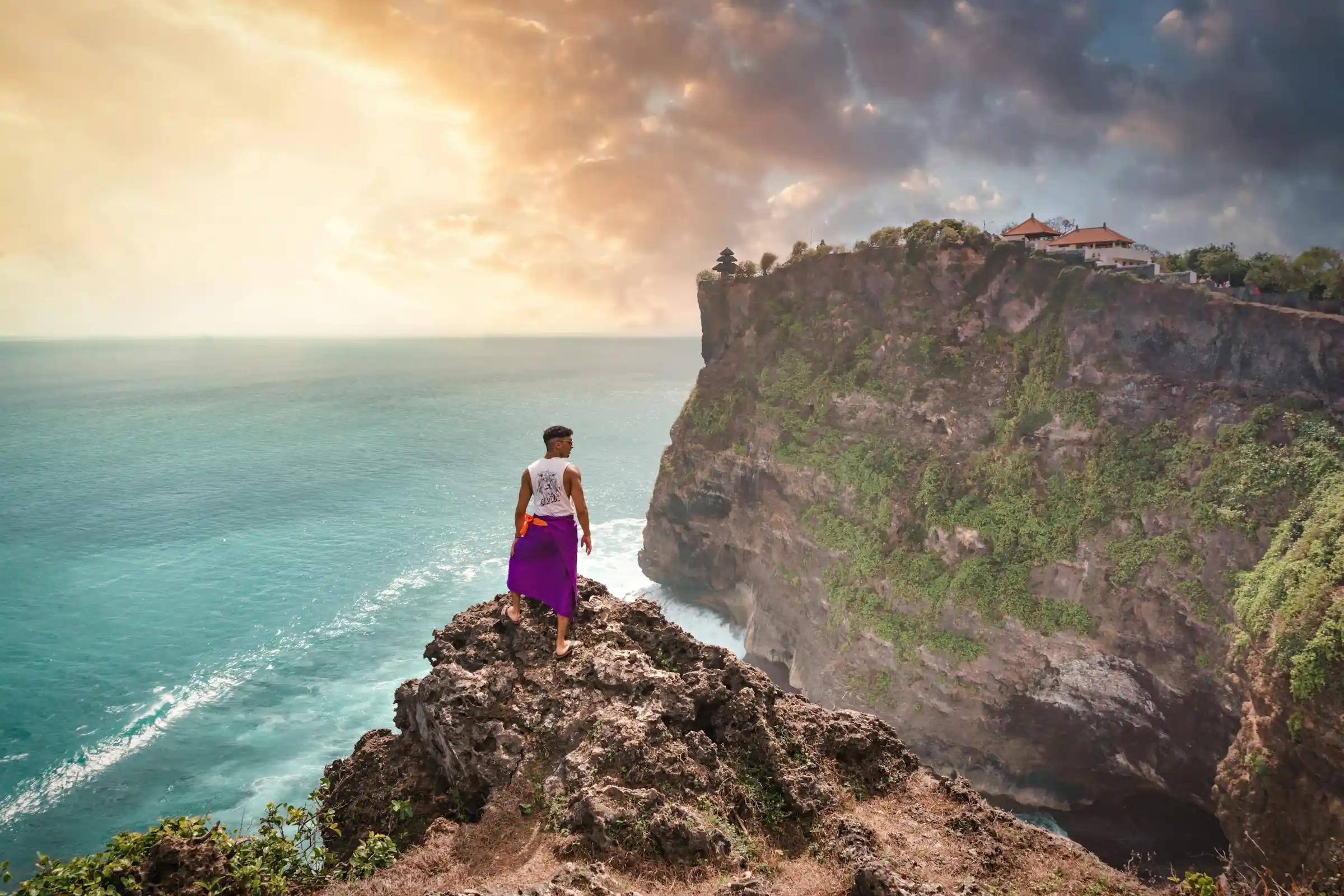 Clifftop path at Uluwatu temple above the ocean, Bali