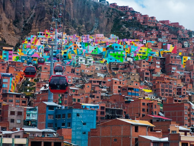 La Paz cityscape with the Mi Teleferico cable car crossing above hillside buildings